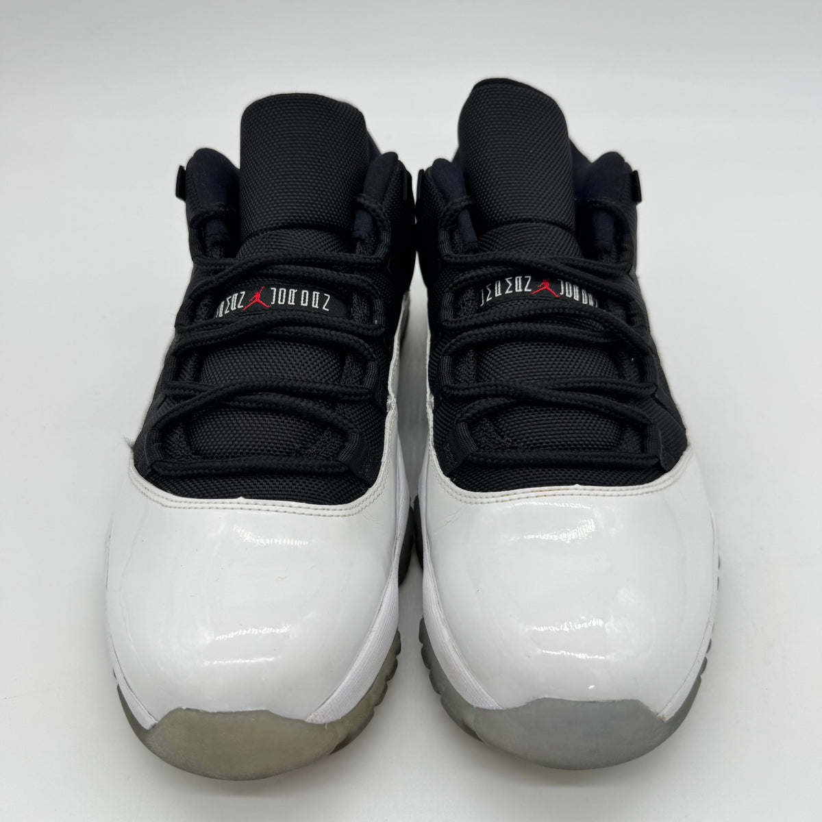 Jordan 11 Low Tuxedo