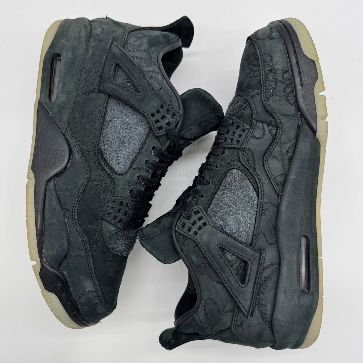 Jordan 4 Kaws Black
