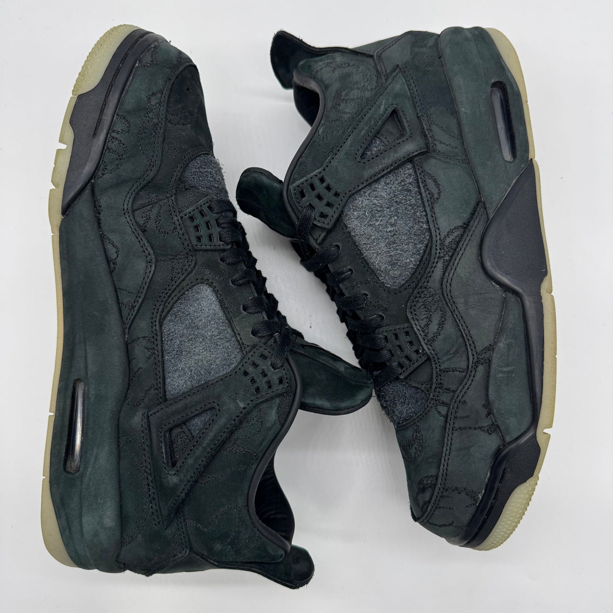 Jordan 4 Kaws Black