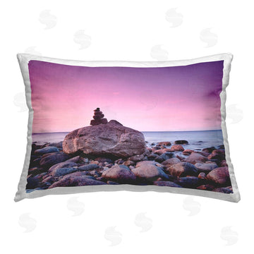 Incado | Stacked Rocks on Shore